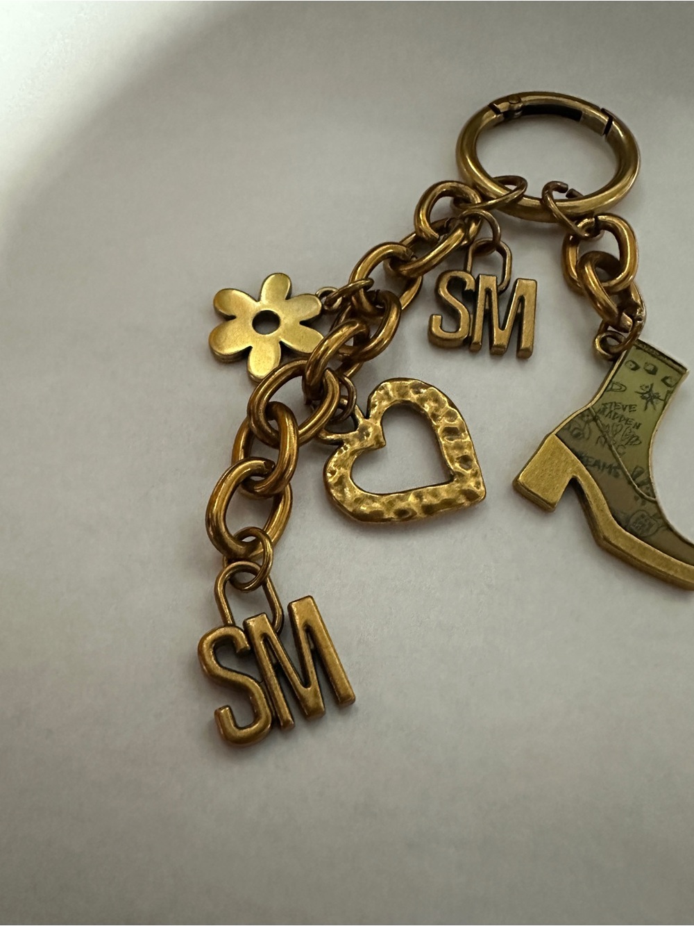 Steve Madden Gold Charm Keychain with Heart, Flower & Boot Charms - Picture 3 of 7